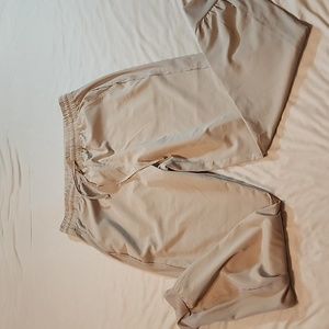 Lightweight tan pants, size 10, drawstring and ankle cuffs